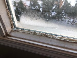 cracked window caulking