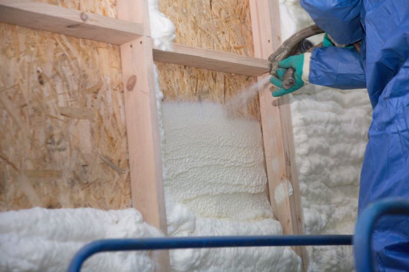 A photo of spray foam insulation being installed.